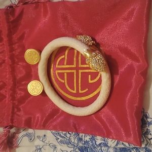 BudhaGirl Stingray Wrist Wrap in Ivory with Lotus End Caps